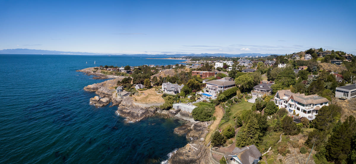 An aerial view of waterfront properties for sale in Victoria, BC.